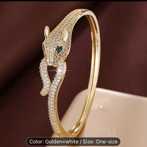Elegant Gold and White Panther Bracelet